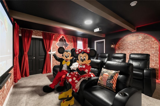 1560 Maidstone Ct, Davenport, FL 33896 - carpeted cinema room with brick wall and beamed ceiling