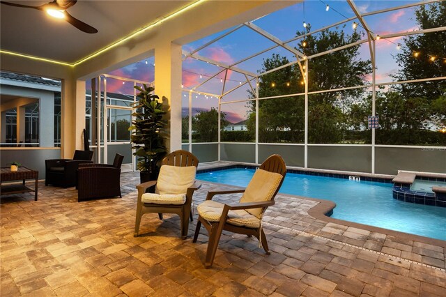1560 Maidstone Ct, Davenport, FL 33896 - view of pool featuring a patio area, a pool with connected hot tub, ceiling fan, and a lanai