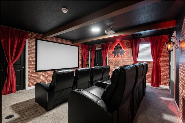 1560 Maidstone Ct, Davenport, FL 33896 - carpeted home theater featuring brick wall, beam ceiling, and a textured ceiling