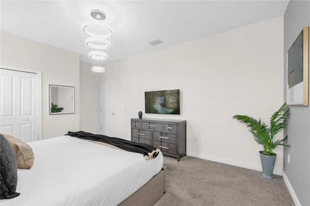 1560 Maidstone Ct, Davenport, FL 33896 - bedroom with light carpet and baseboards