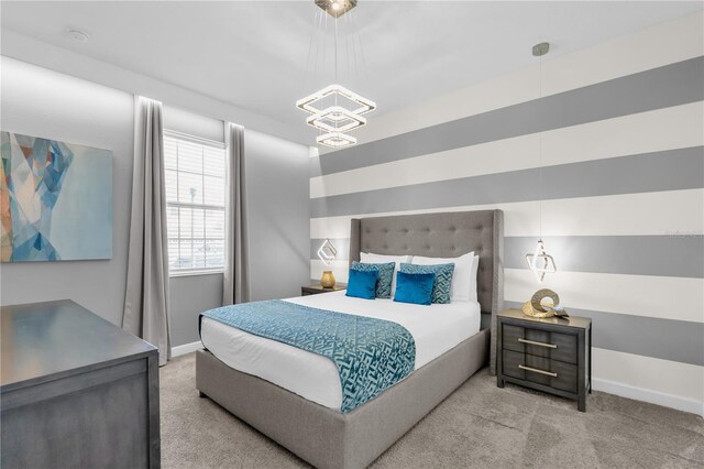 1560 Maidstone Ct, Davenport, FL 33896 - carpeted bedroom featuring baseboards and a chandelier