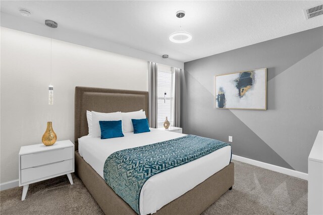 1560 Maidstone Ct, Davenport, FL 33896 - bedroom with carpet floors and baseboards