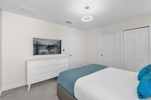 1560 Maidstone Ct, Davenport, FL 33896 - carpeted bedroom with baseboards and a closet