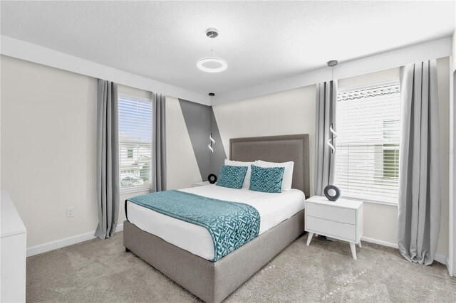 1560 Maidstone Ct, Davenport, FL 33896 - carpeted bedroom with baseboards
