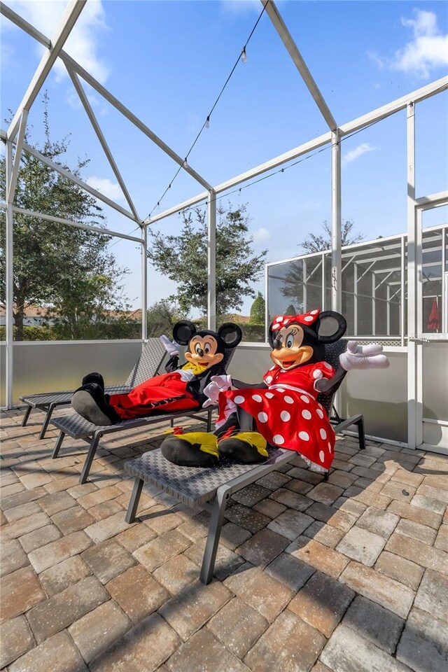1560 Maidstone Ct, Davenport, FL 33896 - view of patio with glass enclosure
