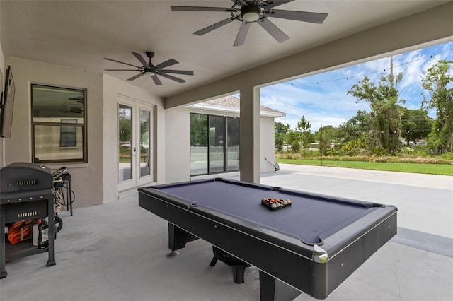 1504 Cordgrass Way, Lakeland, FL 33813 - game room with billiards, french doors, concrete floors, and ceiling fan