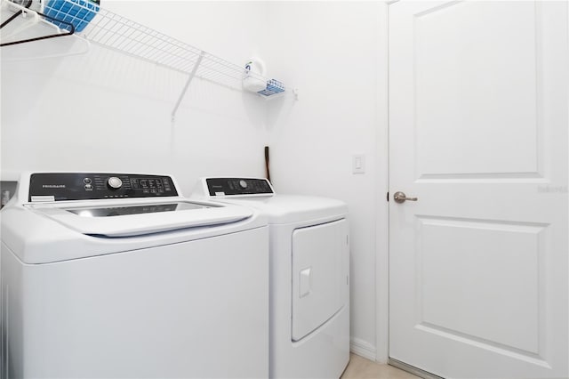 11330 Burgundy Dr, Venice, FL 34293 - laundry room featuring washer and clothes dryer