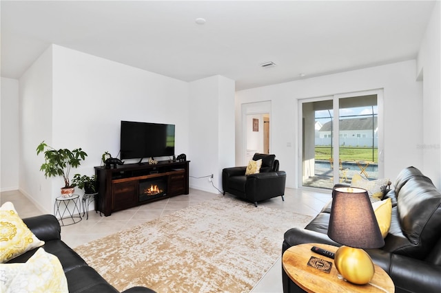 11330 Burgundy Dr, Venice, FL 34293 - living room featuring light tile patterned floors