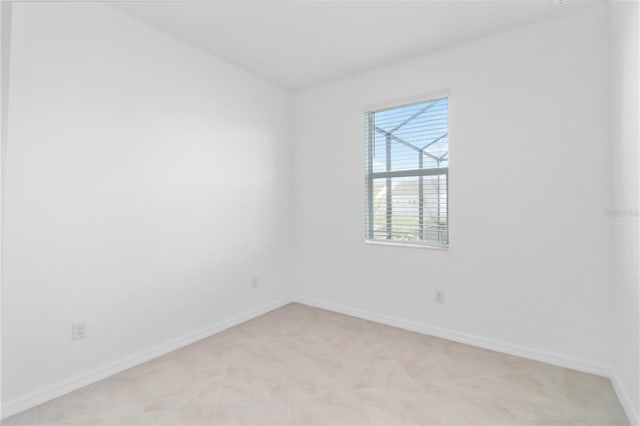 11330 Burgundy Dr, Venice, FL 34293 - empty room featuring baseboards and light carpet