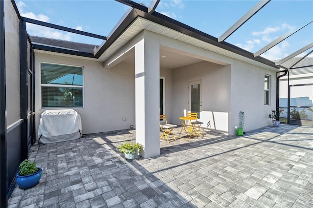 11330 Burgundy Dr, Venice, FL 34293 - view of patio featuring glass enclosure