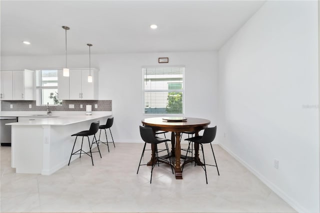 11330 Burgundy Dr, Venice, FL 34293 - dining space with baseboards and recessed lighting