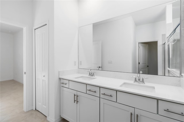 11330 Burgundy Dr, Venice, FL 34293 - bathroom featuring double vanity
