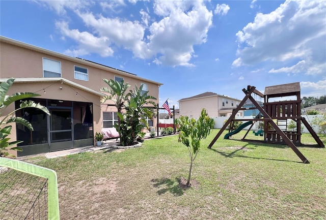 4447 Maple Chase Trl, Kissimmee, FL 34758 - view of yard with a playground and a sunroom