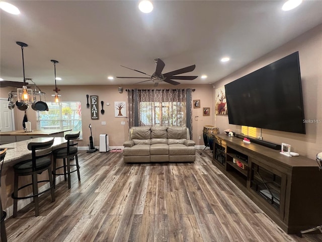 4447 Maple Chase Trl, Kissimmee, FL 34758 - living room featuring recessed lighting, dark wood-style flooring, a ceiling fan, and baseboards