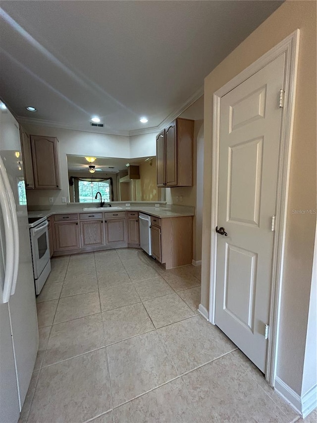 3244 River Branch Cir, Kissimmee, FL 34741 - kitchen featuring white appliances, light countertops, light tile patterned flooring, baseboards, and recessed lighting