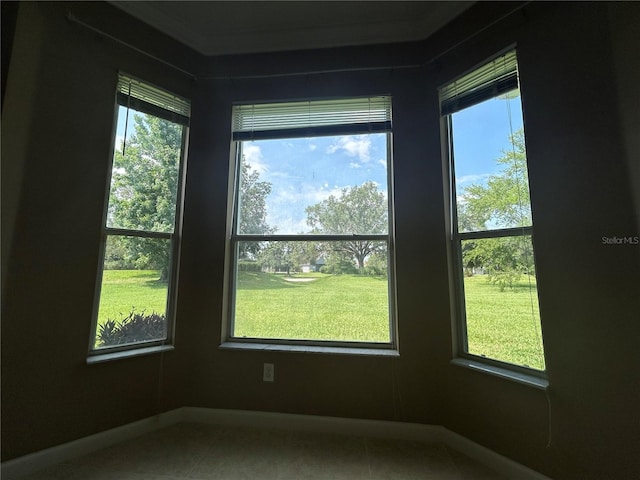 3244 River Branch Cir, Kissimmee, FL 34741 - tiled spare room featuring baseboards