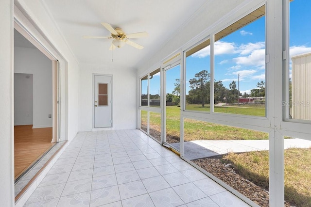 6555 Bay Tree Ct, Saint Cloud, FL 34771 - unfurnished sunroom featuring a ceiling fan