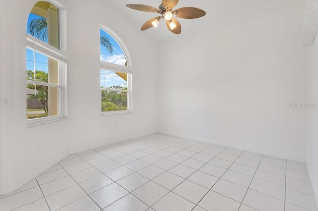 6555 Bay Tree Ct, Saint Cloud, FL 34771 - empty room with ceiling fan and light tile patterned floors