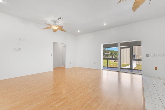6555 Bay Tree Ct, Saint Cloud, FL 34771 - spare room featuring a ceiling fan, light wood-style floors, and recessed lighting