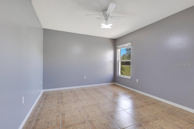 6555 Bay Tree Ct, Saint Cloud, FL 34771 - empty room featuring a ceiling fan and baseboards