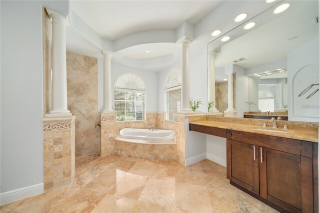 2333 Pinehurst Ct, Davenport, FL 33837 - full bathroom with decorative columns, a garden tub, vanity, walk in shower, and recessed lighting