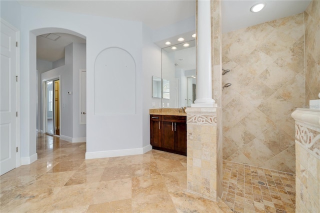 2333 Pinehurst Ct, Davenport, FL 33837 - full bathroom featuring a walk in shower, vanity, baseboards, recessed lighting, and ornate columns