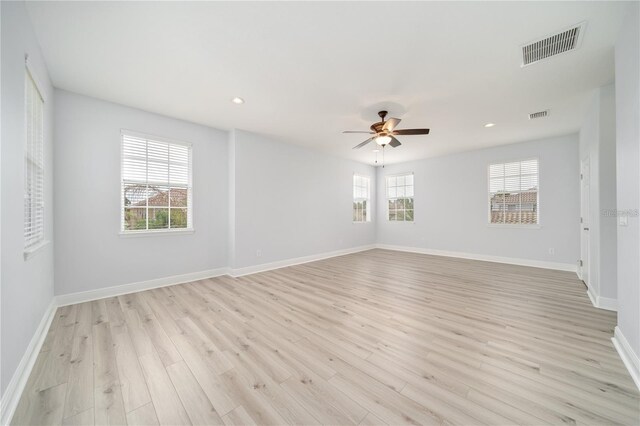 2333 Pinehurst Ct, Davenport, FL 33837 - unfurnished room with light wood-style flooring, ceiling fan, recessed lighting, and baseboards