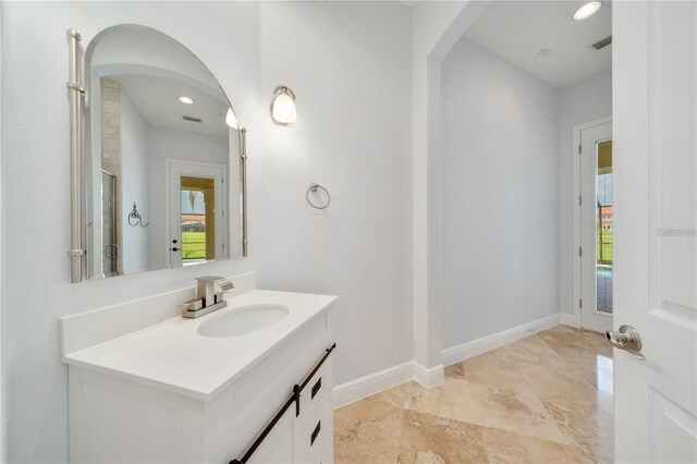 2333 Pinehurst Ct, Davenport, FL 33837 - full bathroom with vanity, an enclosed shower, baseboards, and recessed lighting