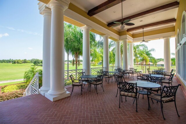 2333 Pinehurst Ct, Davenport, FL 33837 - view of patio / terrace with a ceiling fan and view of golf course