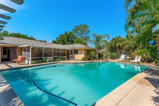 1096 Dyson Dr, Winter Springs, FL 32708 - outdoor pool featuring a sunroom and a patio