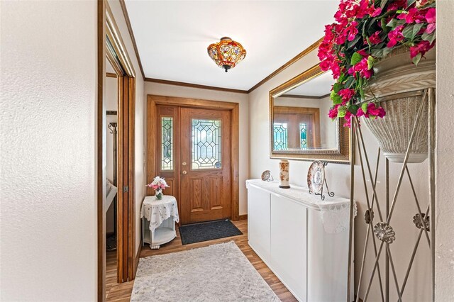 1096 Dyson Dr, Winter Springs, FL 32708 - foyer with wood finished floors and ornamental molding