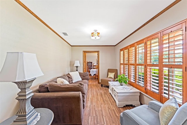 1096 Dyson Dr, Winter Springs, FL 32708 - living area with light wood-style floors and ornamental molding