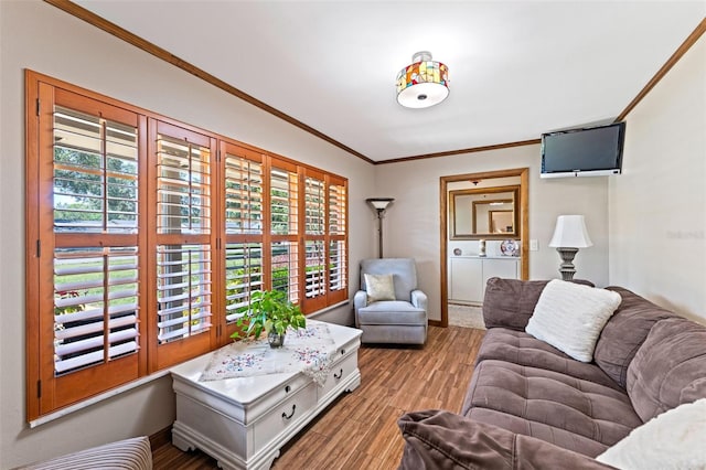 1096 Dyson Dr, Winter Springs, FL 32708 - living area featuring crown molding, healthy amount of natural light, wood finished floors, and baseboards