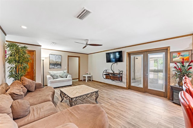 1096 Dyson Dr, Winter Springs, FL 32708 - living room with a ceiling fan, ornamental molding, light wood finished floors, and baseboards