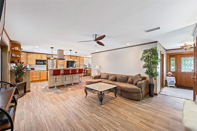 1096 Dyson Dr, Winter Springs, FL 32708 - living room featuring a ceiling fan, light wood-type flooring, recessed lighting, and ornamental molding