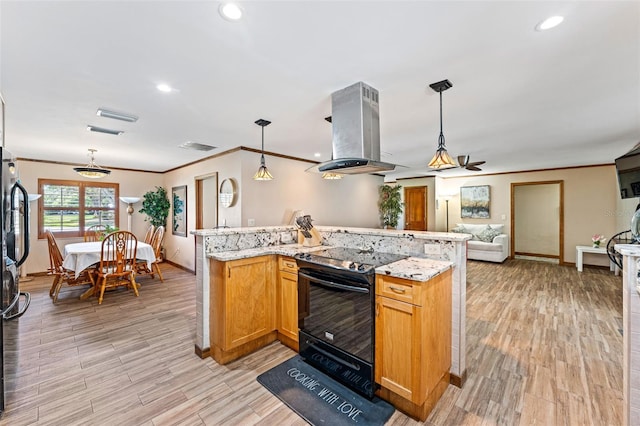 1096 Dyson Dr, Winter Springs, FL 32708 - kitchen with island range hood, electric range, open floor plan, crown molding, and light wood-style flooring