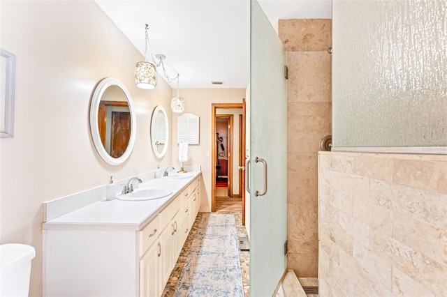 1096 Dyson Dr, Winter Springs, FL 32708 - full bathroom featuring a tile shower, double vanity, and toilet