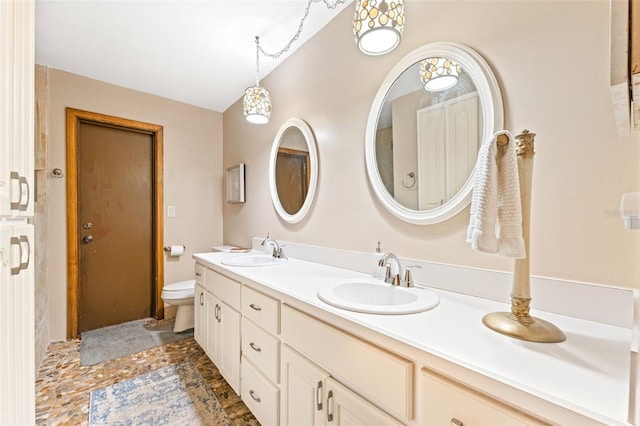 1096 Dyson Dr, Winter Springs, FL 32708 - full bath featuring double vanity, toilet, and stone finish flooring