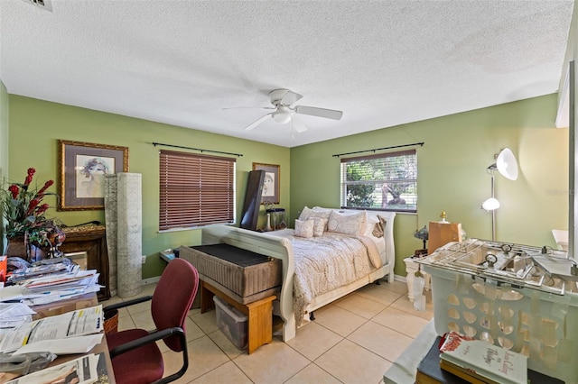 1096 Dyson Dr, Winter Springs, FL 32708 - bedroom with light tile patterned floors, ceiling fan, a textured ceiling, and baseboards