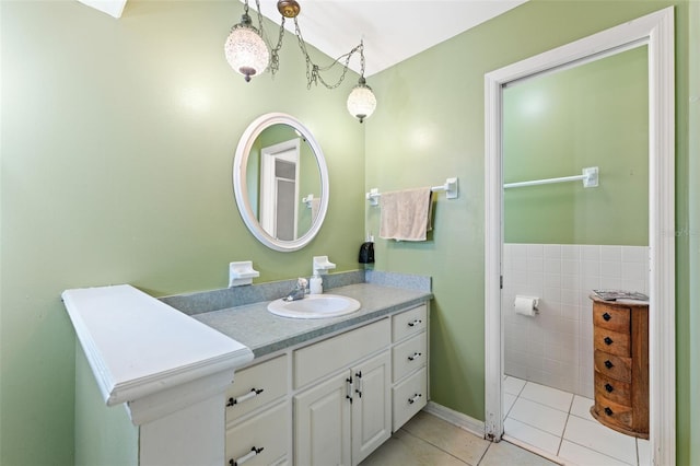 1096 Dyson Dr, Winter Springs, FL 32708 - bathroom with tile patterned flooring, vanity, and tile walls