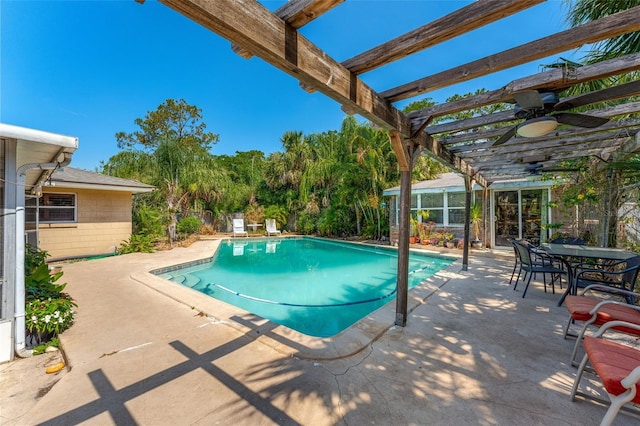 1096 Dyson Dr, Winter Springs, FL 32708 - swimming pool featuring a pergola, a patio area, and a ceiling fan