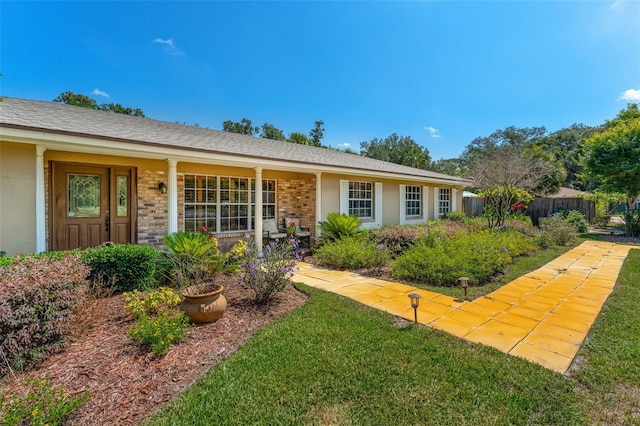 1096 Dyson Dr, Winter Springs, FL 32708 - view of front of property featuring stucco siding and covered porch