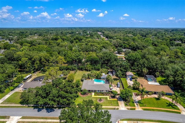 1096 Dyson Dr, Winter Springs, FL 32708 - drone / aerial view of a heavily wooded area and a pool area