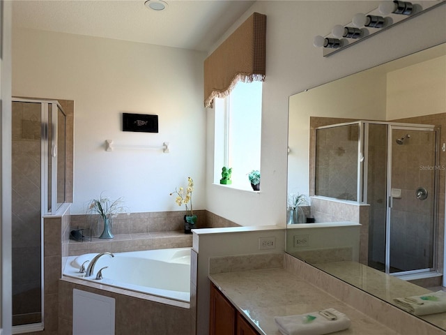 2514 Dharma Cir, Kissimmee, FL 34746 - full bath featuring a garden tub, a shower stall, and vanity