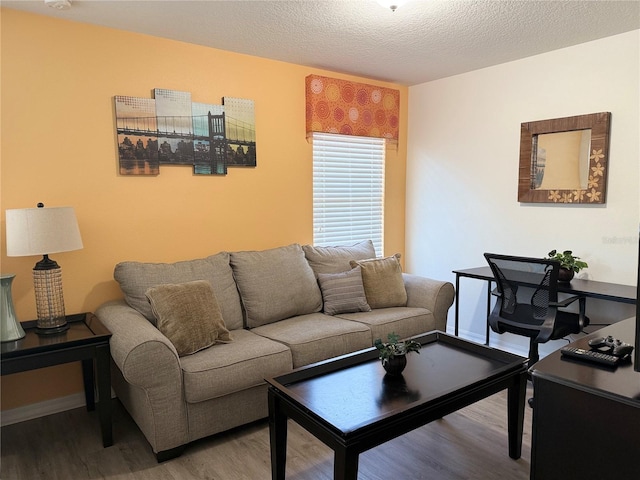 2514 Dharma Cir, Kissimmee, FL 34746 - living area featuring wood finished floors and baseboards