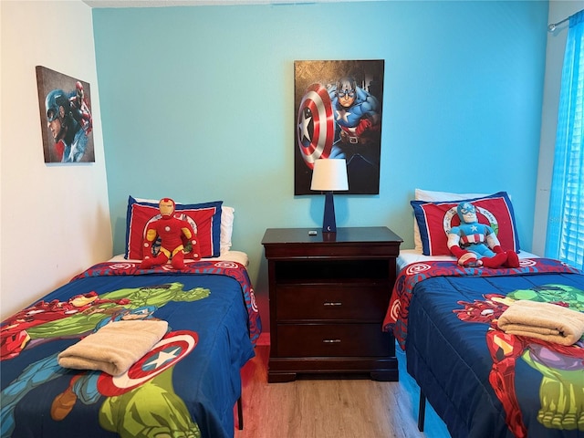 2514 Dharma Cir, Kissimmee, FL 34746 - bedroom with wood finished floors