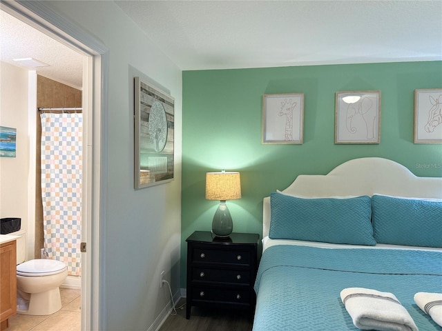 2514 Dharma Cir, Kissimmee, FL 34746 - bedroom featuring connected bathroom
