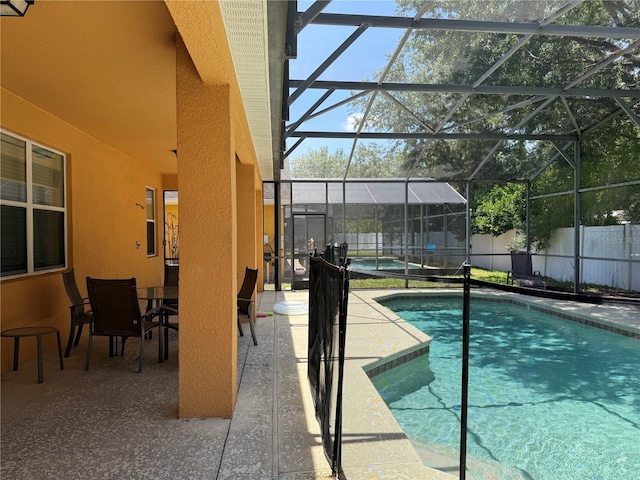 2514 Dharma Cir, Kissimmee, FL 34746 - view of swimming pool with a patio area and a lanai