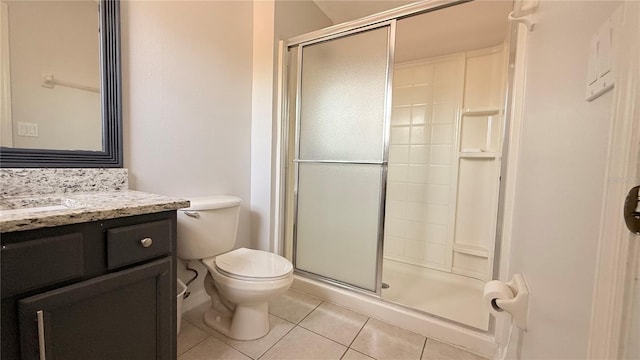 8517 Bay Lilly Loop, Kissimmee, FL 34747 - full bath with a shower stall, tile patterned floors, vanity, and toilet