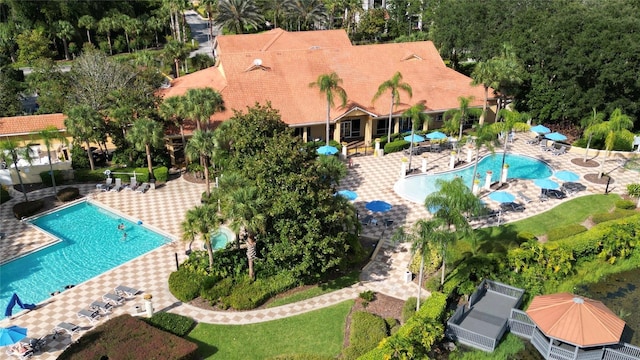 8517 Bay Lilly Loop, Kissimmee, FL 34747 - view of subject property featuring a pool